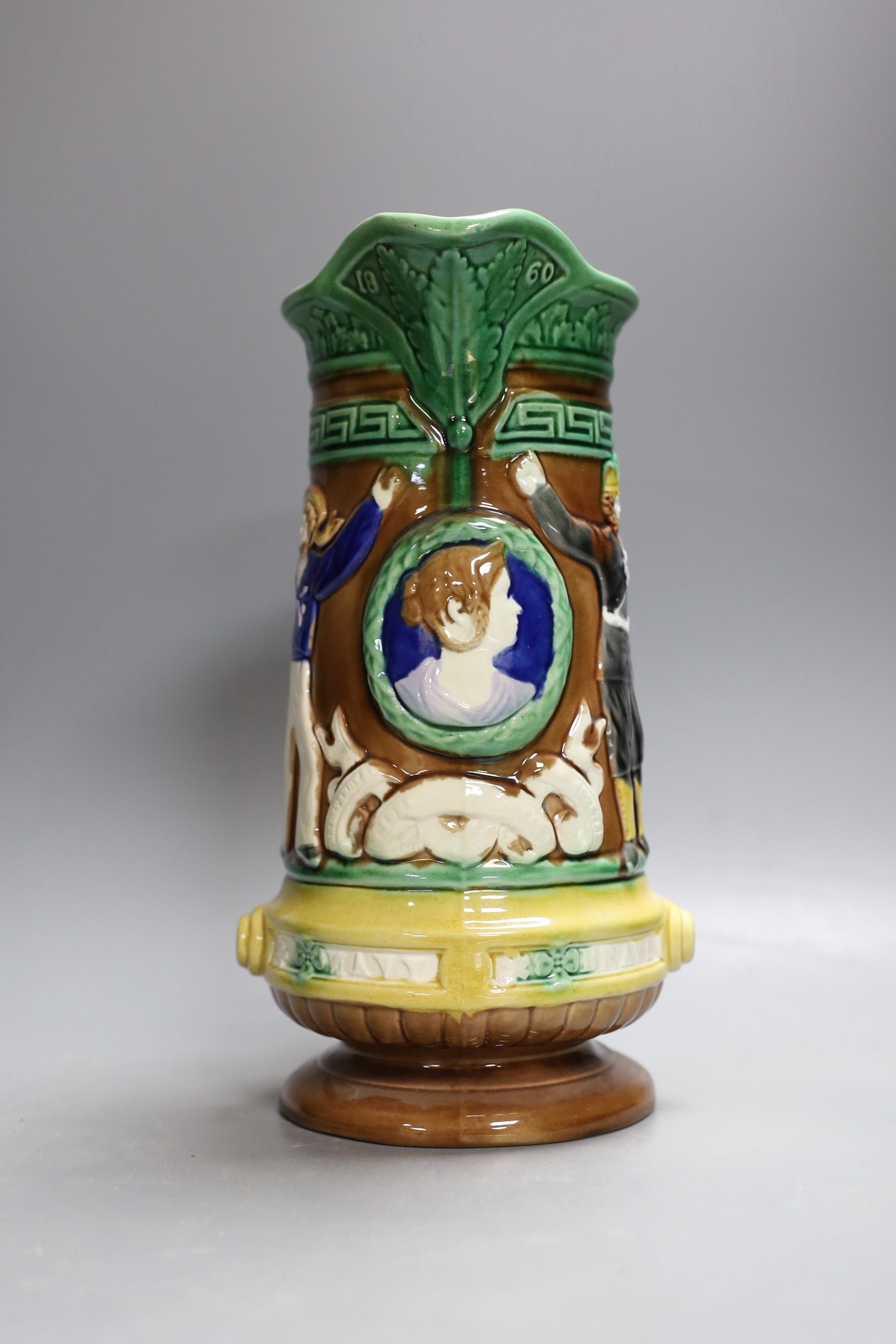 A Victorian Majolica military volunteers commemorative jug - 27cm tall